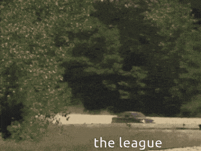 A Blurred Image Of A Boat In The Water With The Words The League Above It GIF