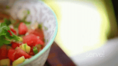 A Blurred Image Of A Bowl Of Food With The Words Serve Written On The Bottom GIF