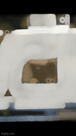 A Blurred Image Of A Box With A Hole In The Middle GIF
