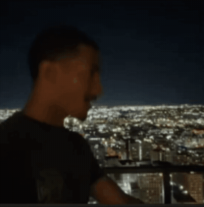A Blurred Image Of A City At Night GIF