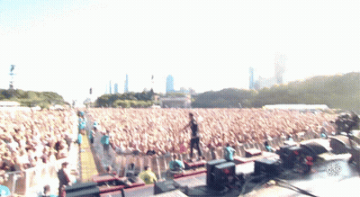 A Blurred Image Of A Crowd At A Concert With The Word Chicago On The Bottom Right GIF