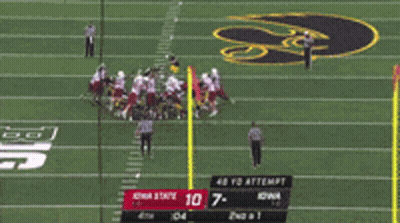 A Blurred Image Of A Football Game With A Score Of 10 7 GIF