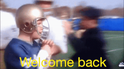 A Blurred Image Of A Football Player And The Words Welcome Back GIF