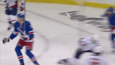 A Blurred Image Of A Hockey Game With Espn Written On The Ice GIF