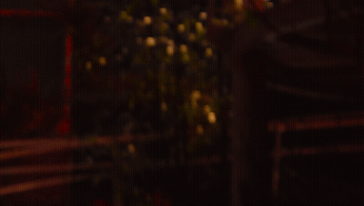 A Blurred Image Of A Light Coming Out Of A Glass GIF