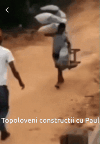 A Blurred Image Of A Man Carrying A Chair With Topoloveni Constructii Cu Paul Written Below GIF