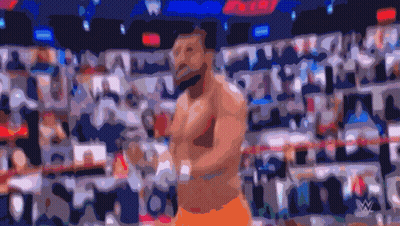 A Blurred Image Of A Man In A Boxing Ring With A W Logo In The Corner GIF