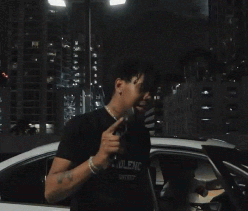 A Blurred Image Of A Man In A Car GIF