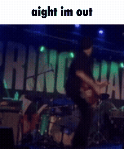 A Blurred Image Of A Man Playing A Guitar On Stage With The Words Aight Im Out Above Him GIF