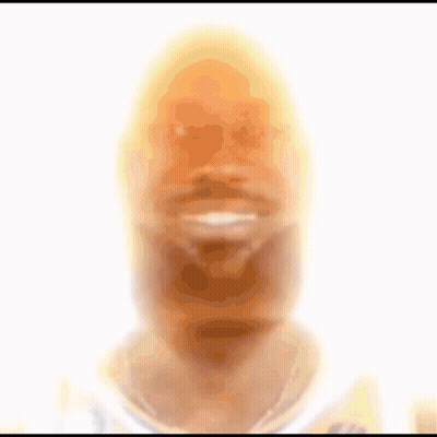 A Blurred Image Of A Man 'S Face With A White Background GIF