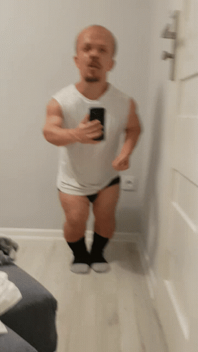 A Blurred Image Of A Man Taking A Picture Of Himself GIF