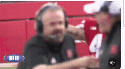 A Blurred Image Of A Man Wearing Headphones And A Number 4 Shirt GIF