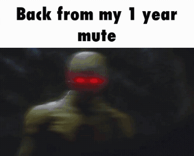 A Blurred Image Of A Man With The Words Back From My 1 Year Mute GIF