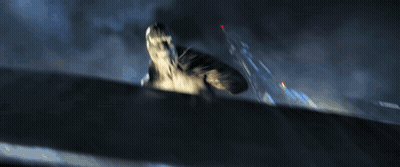 A Blurred Image Of A Monster With A Red Light In The Corner GIF