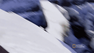 A Blurred Image Of A Mountain With The Words National Geographic In The Corner GIF