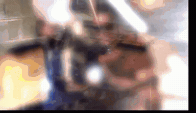 A Blurred Image Of A Person Playing A Violin GIF