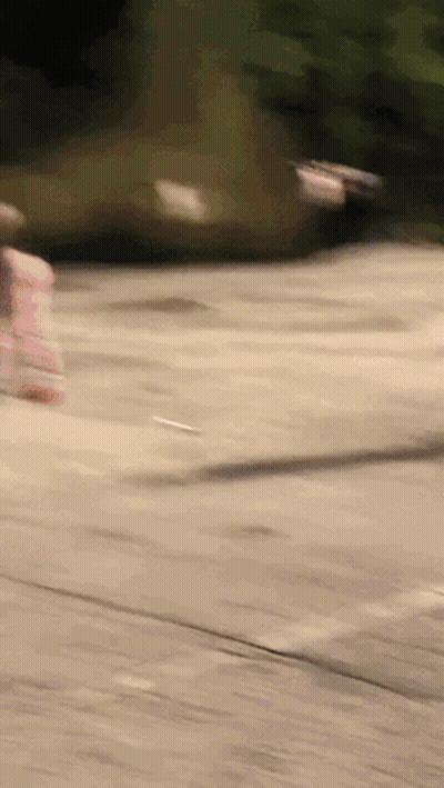 A Blurred Image Of A Person Riding A Skateboard GIF