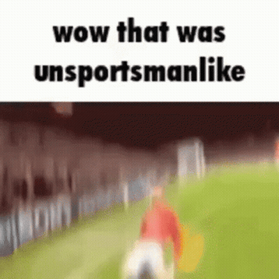 A Blurred Image Of A Person Running On A Soccer Field With The Words Wow That Was Unsportsmanlike . GIF