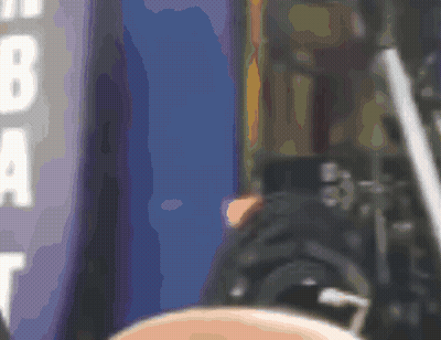 A Blurred Image Of A Person Standing In Front Of A Sign That Says Nba GIF