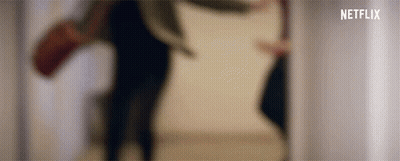 A Blurred Image Of A Person Walking Down Stairs . GIF