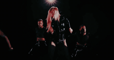 A Blurred Image Of A Person Walking In The Dark GIF