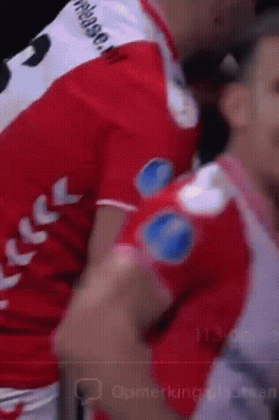 A Blurred Image Of A Person Wearing A Red Shirt With The Number 8 On The Back GIF
