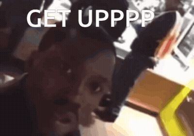 A Blurred Image Of A Person With The Words Get Upppp Written On The Bottom GIF