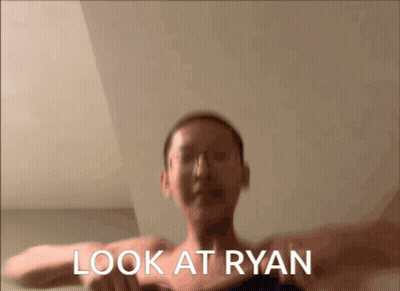 A Blurred Image Of A Person With The Words Look At Ryan Written Below Them GIF
