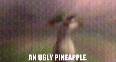 A Blurred Image Of A Pineapple With The Words `` An Ugly Pineapple '' Written Above It . GIF
