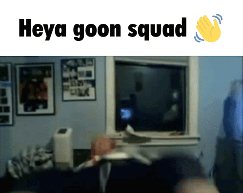A Blurred Image Of A Room With The Words Heya Goon Squad Below It GIF