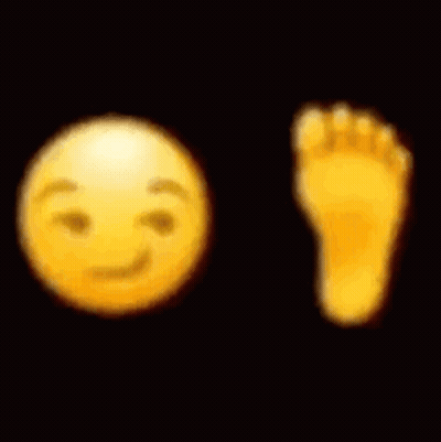 A Blurred Image Of A Smiley Face And A Foot . GIF