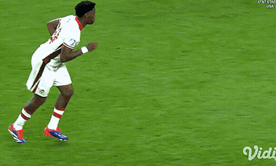 A Blurred Image Of A Soccer Field With The Words At & T Stad Usa On The Bottom Right GIF
