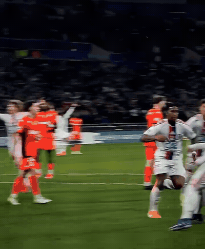 A Blurred Image Of A Soccer Game With A Player Wearing A Jersey That Says ' Lg ' On It GIF