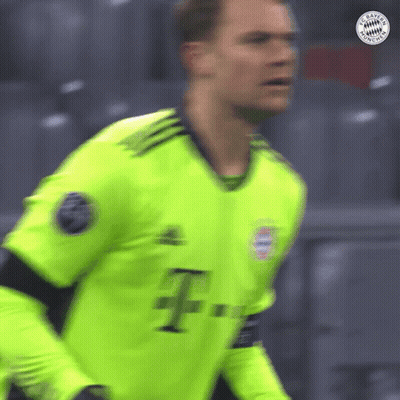 A Blurred Image Of A Soccer Player Wearing A Neon Green Jersey GIF