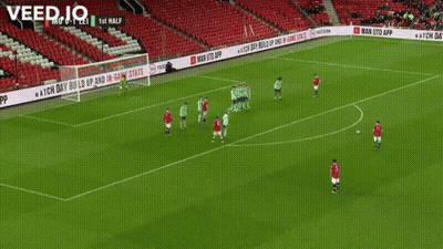 A Blurred Image Of A Soccer Player With The Words Veed.io On The Bottom GIF