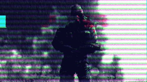 A Blurred Image Of A Soldier With A Purple Background GIF