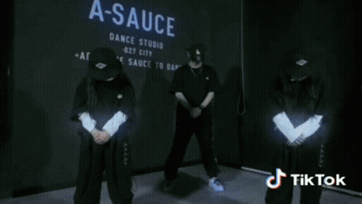 A Blurred Image Of A Stage With A Tiktok Logo GIF