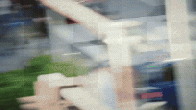 A Blurred Image Of A Staircase In A Building GIF