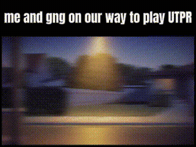 a blurred image of a street with the words me and gng on our way to play utpr