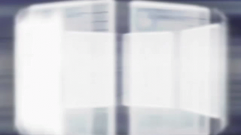 A Blurred Image Of A White Refrigerator With The Door Open GIF