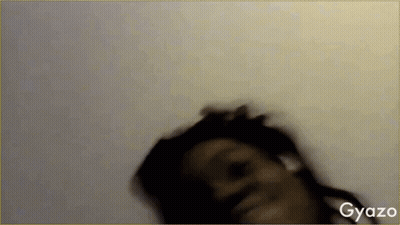 A Blurred Image Of A Woman With Gyazo Written On The Bottom Right Corner GIF