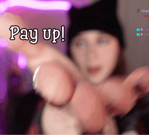 A Blurred Image Of A Woman With The Words Pay Up Written On It GIF