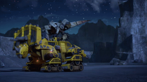 A Blurred Image Of A Yellow Robot With A Bat Flying In The Background GIF