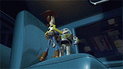 A Blurred Image Of Buzz Lightyear Reaching For Something GIF