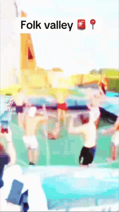 A Blurred Image Of People In A Pool With The Words Folk Valley At The Bottom GIF