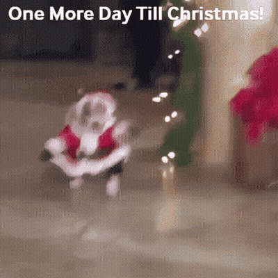 A Blurred Image Of Santa Claus With The Words One More Day Till Christmas Below Him GIF