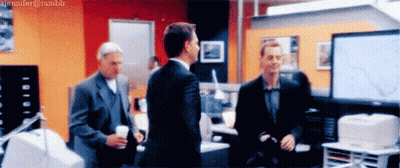 A Blurred Image Of Three Men Standing In An Office With The Hashtag Jennifer @ Tumblr At The Bottom GIF