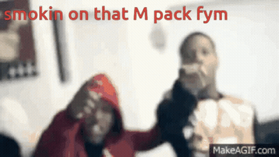 A Blurred Image Of Two People With The Words Smokin On That M Pack Fym GIF
