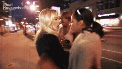 A Blurred Image Of Two Women With The Words Real Housewives Out Of Context Behind Them GIF