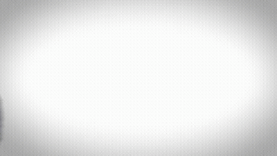 A Blurry Image Of A Man In A Blue Suit GIF